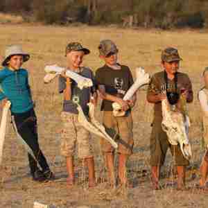 100. Imvelo Safari Lodges - Camelthorn - Kids having fun with some giraffe bones